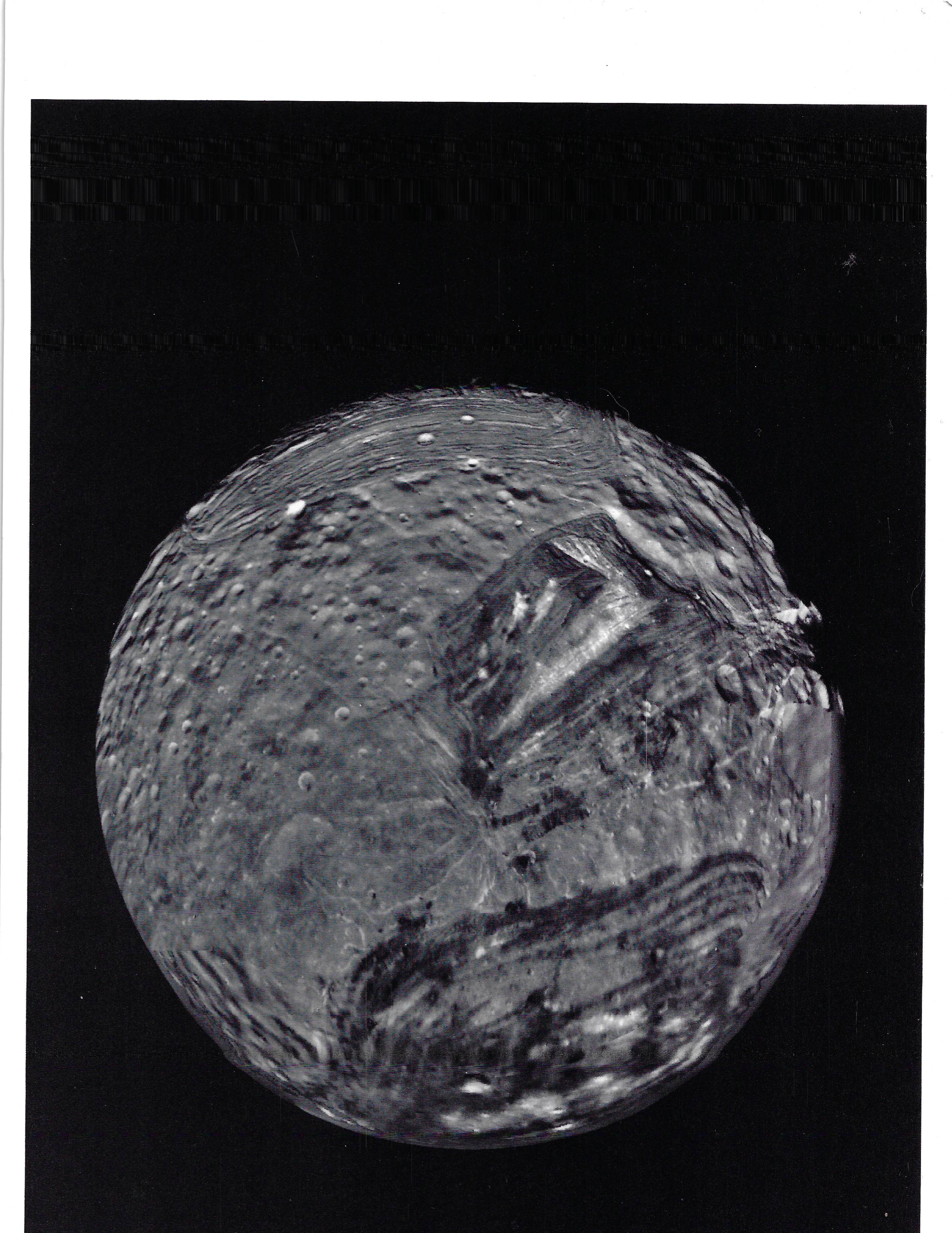 Uranus’ moon Miranda is shown in a computer-assembled mosaic of images obtained on January 24, 1986, by the Voyager 2 spacecraft.